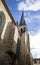 Europe, France. Small Gothic Church. Easter Morning with the Sun Behind the Church Cross