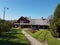 Europe. Poland country, Jaslo city. Wooden cottage house. Front yard of a village.