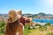 Europe travel woman looking at Dubrovnik town from viewpoint, Croatia, Europe