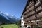 European alpine ski chalet hotel, view of the Alps in distance, copy space