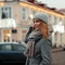 European beautiful woman in fashion stylish coat with a knitted