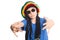 European boy in a cap with dreadlocks sings rap
