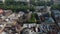 European City in spring. Densely populated areas of the city. Panorama of the ancient town. Aerial Roofs and streets Old