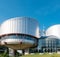 European Court of Human Rights with Half-mast EU flag waving in