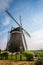 European dutch old windmill landscape with blue sky