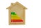 European energy classification label in wooden house on white background, energy consumption chart concept