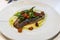 European Food: Pan-fried sea bream with cherry tomatos and basil