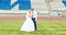 European Football Championship concept. Wedding couple on the football stadium.