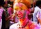 European girl celebrate festival Holi in Delhi, India.
