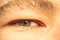 European guy`s eye close up. part of the face macro. the eyeball is extremely close. Human pupil