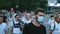 European lockdown demonstration rally, people in face masks against restrictions