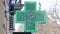 EUROPEAN PHARMACY SIGN: The green cross, often animated, is a symbol found in many countries in Europe