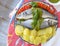 European sea bass branzino steaming basil sauce recipe high angle up view