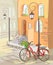 European street with a bicycle and lanterns