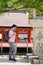 European tourist visit Itsukushima Jinja Otorii in Miyajima, Japan.