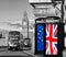 European Union and British Union flag on phone booths against Big Ben in London, England, UK, Stay or leave, Brexit