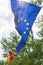 European Union EU flag in forest nature outdoor tree, czech german border