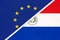 European Union or EU vs Paraguay national flag from textile. Symbol of the Council of Europe association