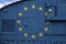 European union flag depicted on side part of military armored tank closeup. Army forces conceptual background