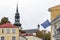European Union flag waving on wind outdoors in european old town, EU
