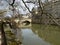 European Winter River Scene with Bridge