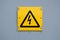 European yellow lightning sign of high voltage. Warning about dangerous electricity