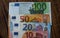 A euros bills on a wooden background