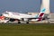 Eurowings Airbus A320 D-ABNI passenger plane arrival and landing at Vienna International Airport
