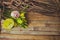 Eustoma and rose lying on a wooden board