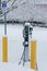 EV charging station for zero emission cars on white snow background