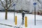 EV charging station for zero emission cars on white snow background