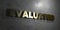 Evaluated - Gold text on black background - 3D rendered royalty free stock picture