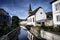 Evangelical trinity church reflected in the urft river