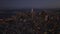 Evening aerial panoramic footage of illuminated downtown. Transamerica Pyramid, Salesforce Tower and surrounding