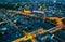 Evening aerial view of Laval with buildings, river Mayenne and old bridge