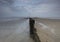 Evening at the Beach with flat sands and Autumn skies