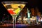 Evening city background with full martini glass