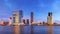 Evening cityscape - view of Rotterdam with Tower blocks in the Kop van Zuid neighbourhood and Erasmus Bridge