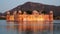 Evening close up of jal mahal palace illuminated by lights in jaipur