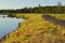 Evening. Coastline of northern lake and trail. Lapland