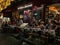 Evening diners crowd outside tables at Montmartre restaurant