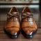 Evening elegance mans brown leather shoes with a bow tie