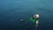 Evening fishing on vessel with lights reflecting on water