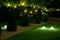 Evening illumination backyard light garden with electric ground sphere lantern.