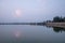 The evening lake reflected the mountains and the sky on both sides