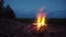 Evening landscape - beautiful campfire on field. 4K