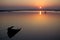 Evening landscape with flooded boat