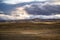 Evening landscape of plowed fields on a hilly area ready for spring sowing