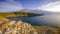 Evening light on the Ceredigion cliffs and Cardigan Island from Mwnt, Wales