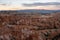 Evening Light Fades Across The Landcape Below Bryce Canyon